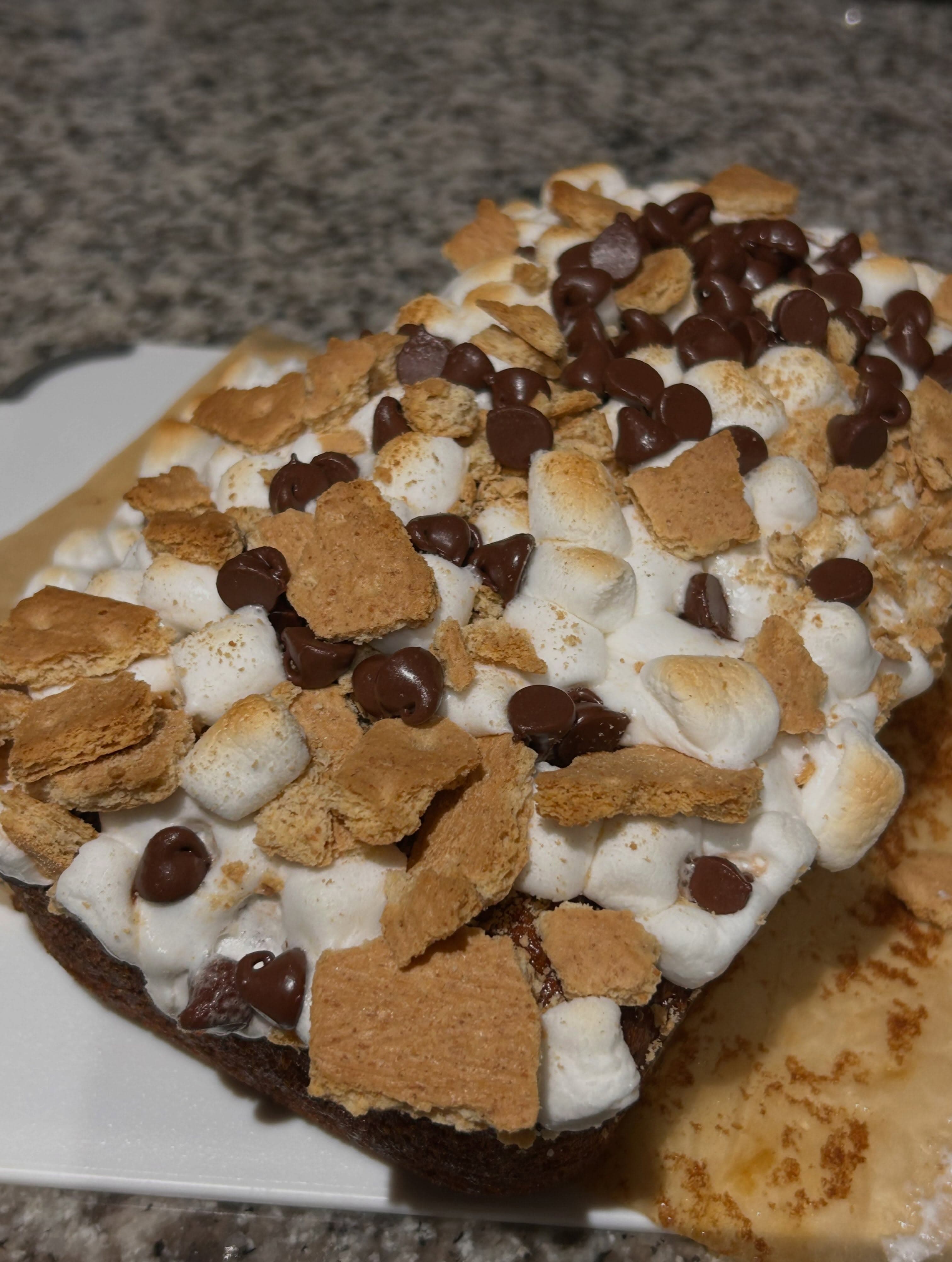 Mya's s'mores loaf with toasted marshmallows, chocolate, and graham crackers